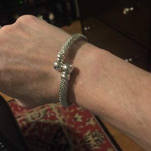 14 k gold white gold flexible bangle.