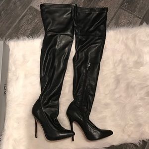 Thigh high leather boots
