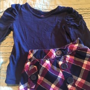 Navy shirt and plaid skirt