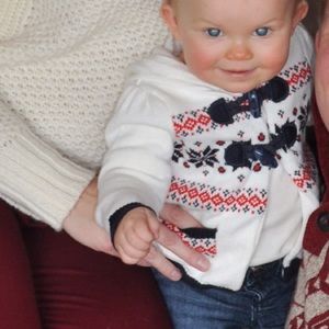 Adorable hoodie sweater with toggle clasp.