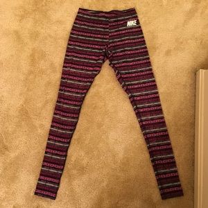 Nike pants pink and black pattern