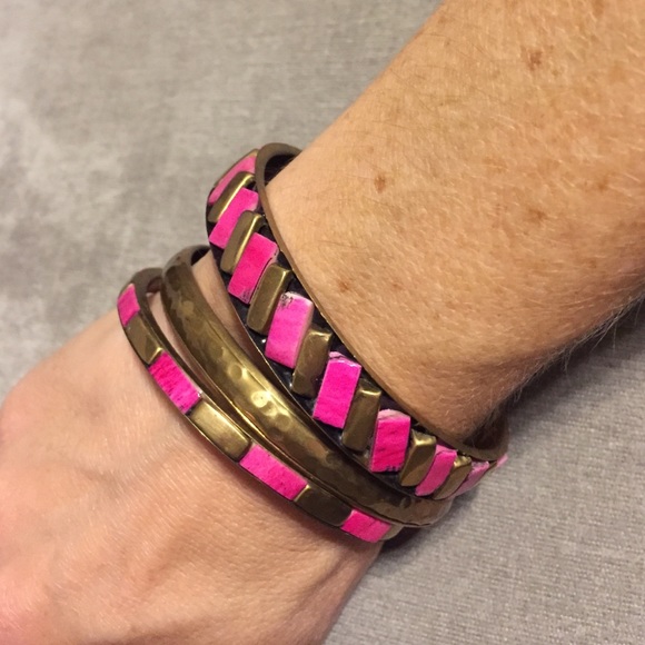 3 hot pink and brass bangles