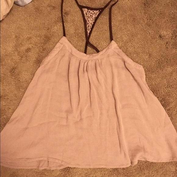 Tank top tan, with dark brown raceback like