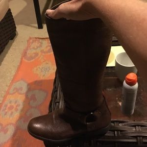 Brown leather with cute red zip back tall boots.