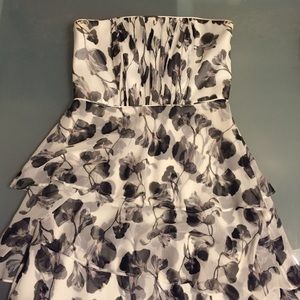 White, black, gray, tiny pink buds