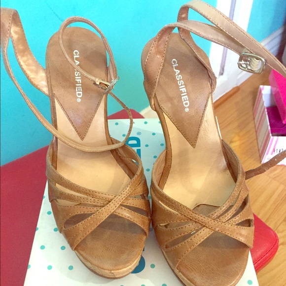 Tan peep toe wrap around in the ankle wedges size7