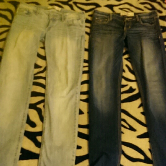 Two pairs of Hollister skinny jeans.