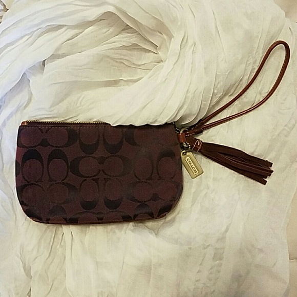 Small purple Coach wristlet