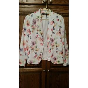 Floral blazer size large. Never worn.