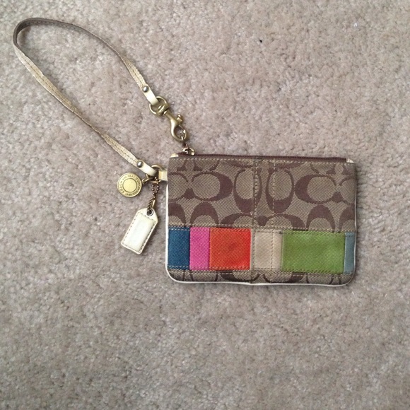 Authentic COACH signature stripe wristlet