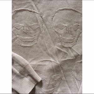 Baby pink cropped skull sweater