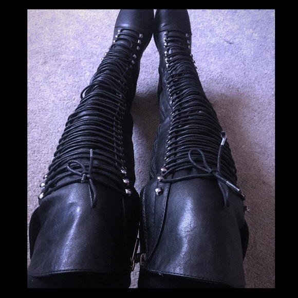 Over the knee laced up combat boots