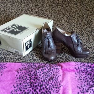 Brown heeled Frye oxfords