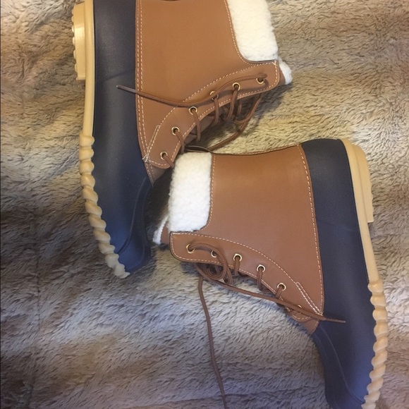 Navy and tan duck boots