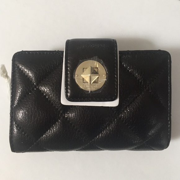 Brand new Kate spade wallet with tags