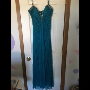 Size 11/12 Turquoise long spaghetti strap dress.