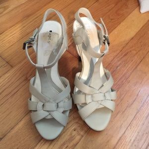 Neutral leather Apt. 9 shoes with a dark wood heel