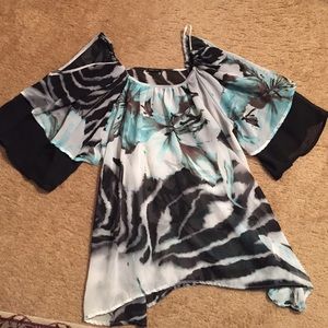 Black,  blue, and white sheer blouse