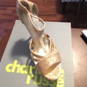 Gold glitter high heels