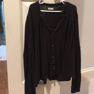 Black peasant style long sleeve cropped top.