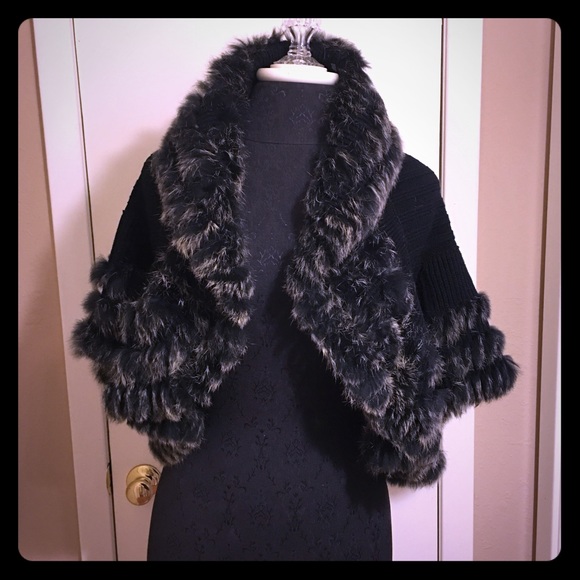 Fur trimmed sweater/jacket.