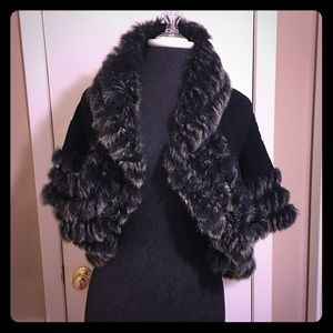 Fur trimmed sweater/jacket.