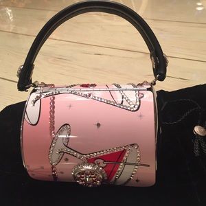 Authentic Little Earth cyclone purse