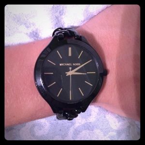 Black and gold Michael Kors watch