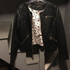 Never worn back quilted leather jacket