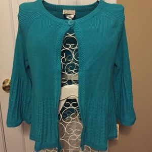 Sweet sweater. One button closures