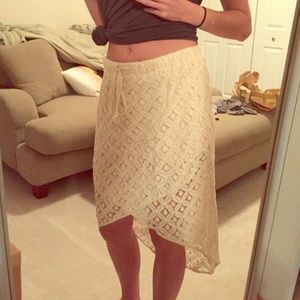 Cream colored high-low skirt