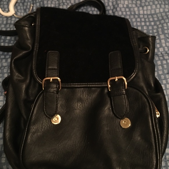 faux leather with gold hardware and faux fur