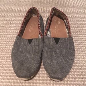 Toms with tribal trim