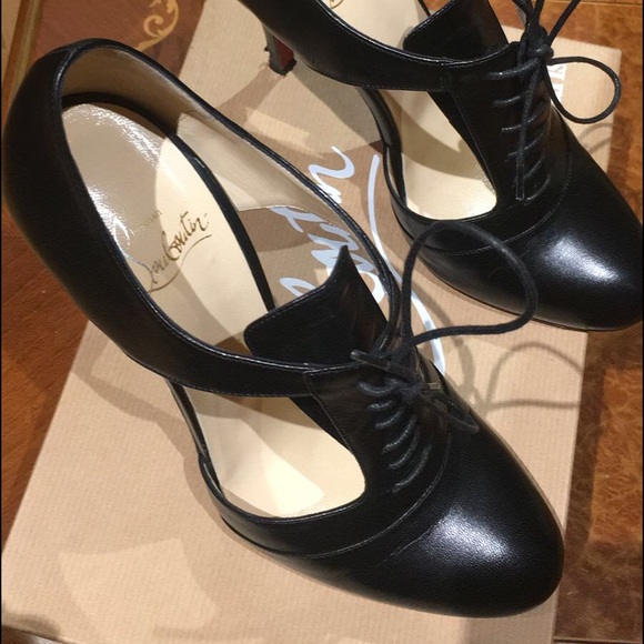 Christian louboutin black lace up ankle bootie