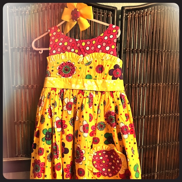 Jelly the Pug dress with matching bow.