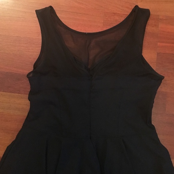 Black peplum Bebe dress. Sz. L - Picture 3 of 4