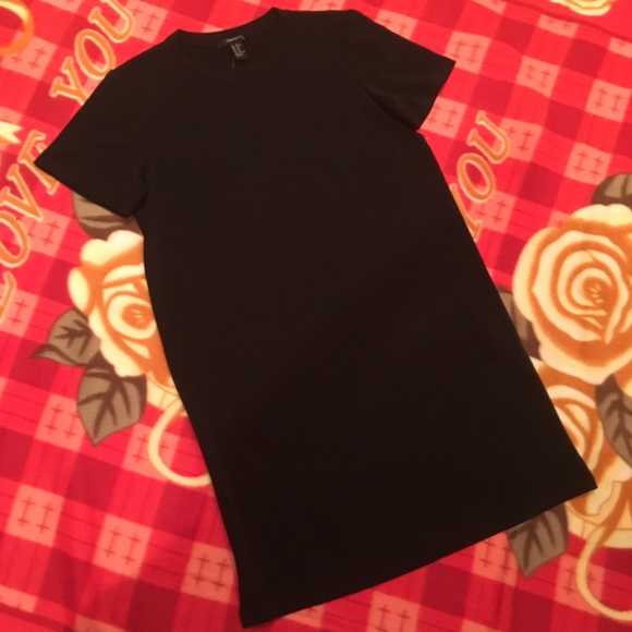 A black women's short black dress - Picture 1 of 4