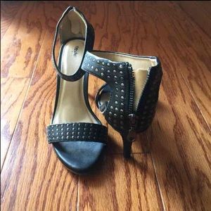 Open toed black pumps