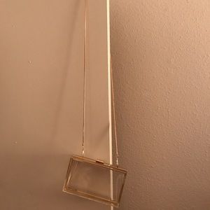 Clear and gold cross body purse