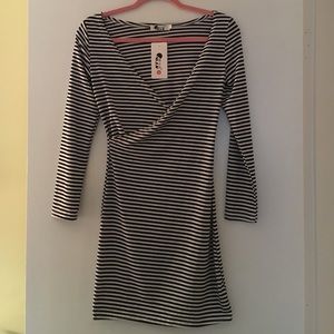 Faux wrap style fitted dress.