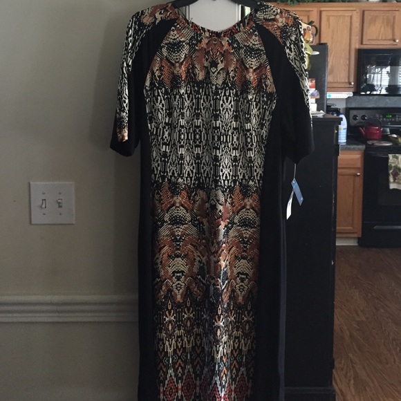 Gabby  Skye dress, zipper in back, size 16.