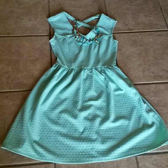 Baby doll seafoam color dress.
