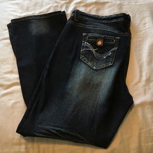 Distressed boot cut jeans