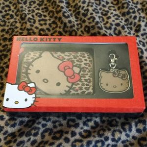Hello Kitty tech wallet and metal bag charm