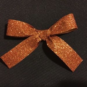 Orange glitter bow