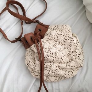 Beige lace drawstring bag