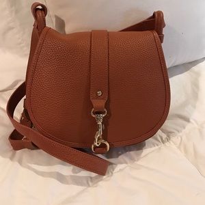 Brown leather saddle bag