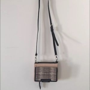 Vince Camuto pink and back small cross body bag