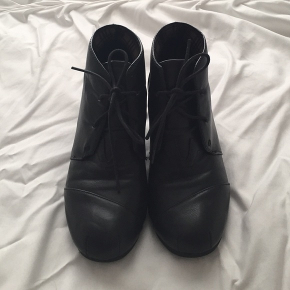 Black leather wedged booties