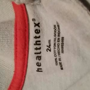 two short sleeve collared shirts